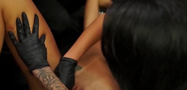 Marina Angel is explored by two tattooed porn fetish artists